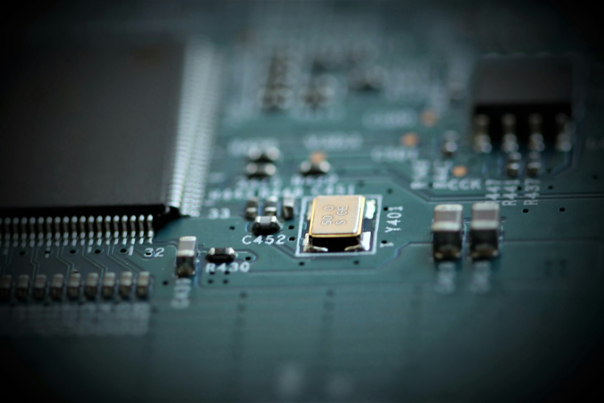 Close-up of an embedded circuit board with a microcontroller and sensor components